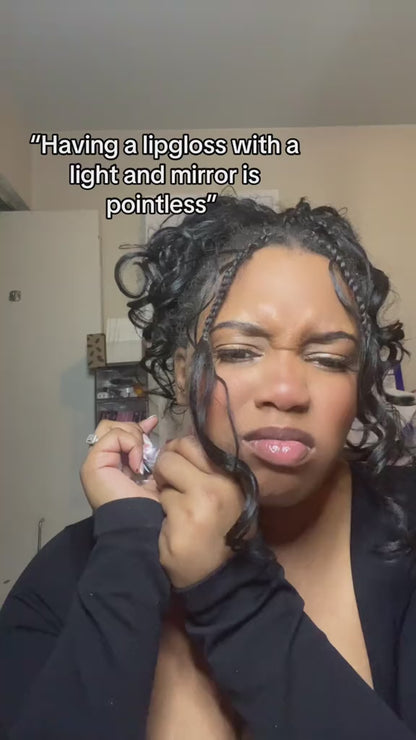 Viral Strawberry Lip Gloss with Light & Mirror – High-shine, sweet scent, and a built-in mirror with LED . Your lips, but glossier.